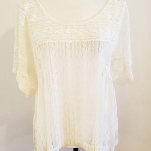 NWT SIZE MEDIUM LACE TOP. FREE PEOPLE BRAND. IVORY